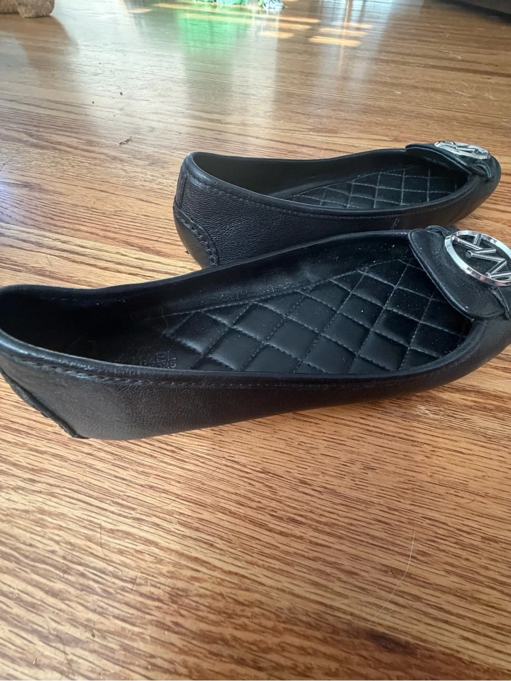 Michael Kors Black Quilted Leather Ballet Flats with Silver MK Emblem